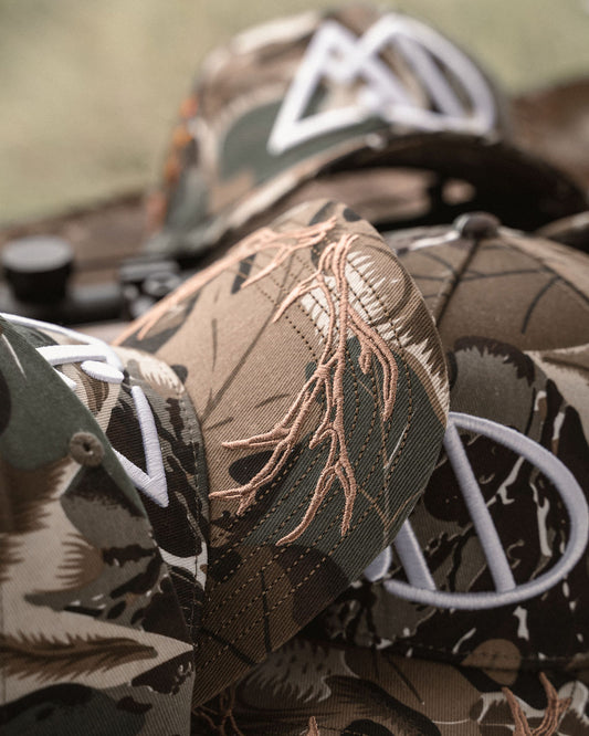 alber.dose “kneeling hunter” cap